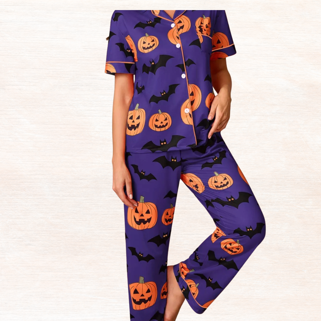 Purple Halloween pajama set with short-sleeve button top and lounge pants, pumpkin and bat