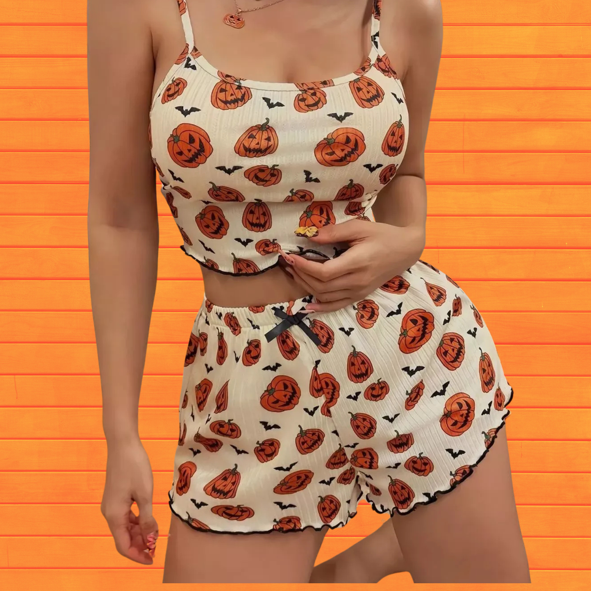White pumpkin print cami and shorts lounge set with black trim and elastic waistband