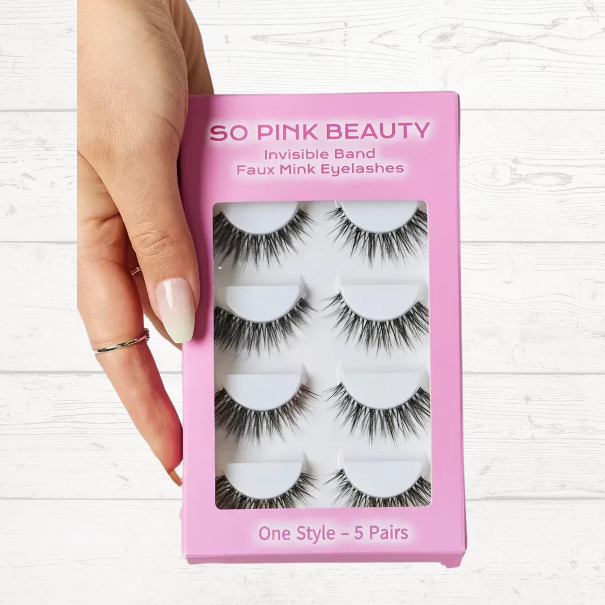 SO PINK BEAUTY faux mink eyelashes box with invisible band, five pairs shown in tray