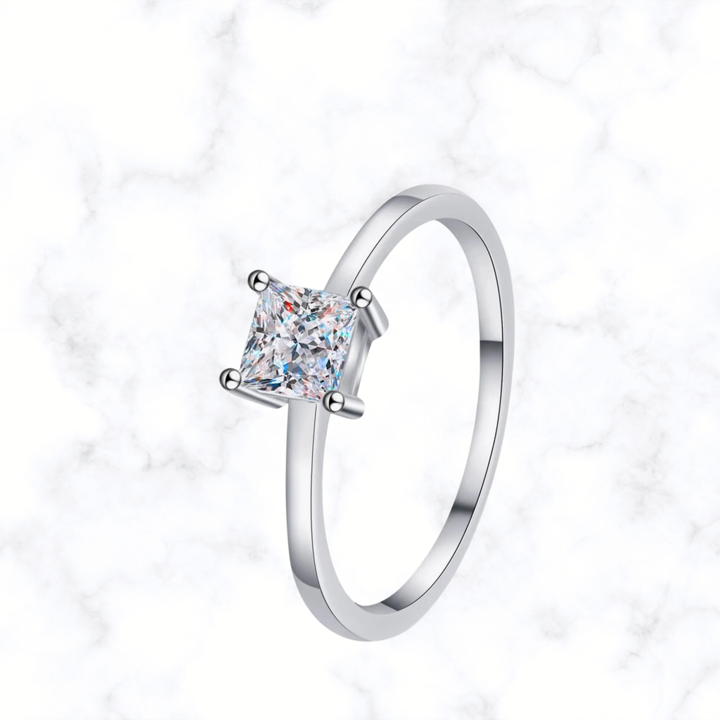 Sterling silver solitaire ring with princess-cut moissanite, four-prong setting