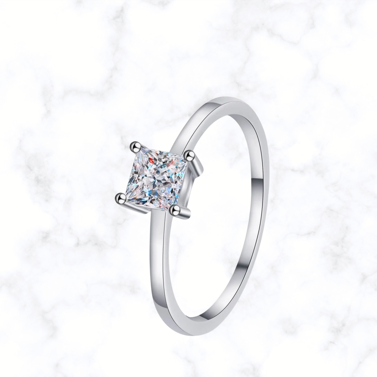 Sterling silver solitaire ring with princess-cut moissanite, four-prong setting