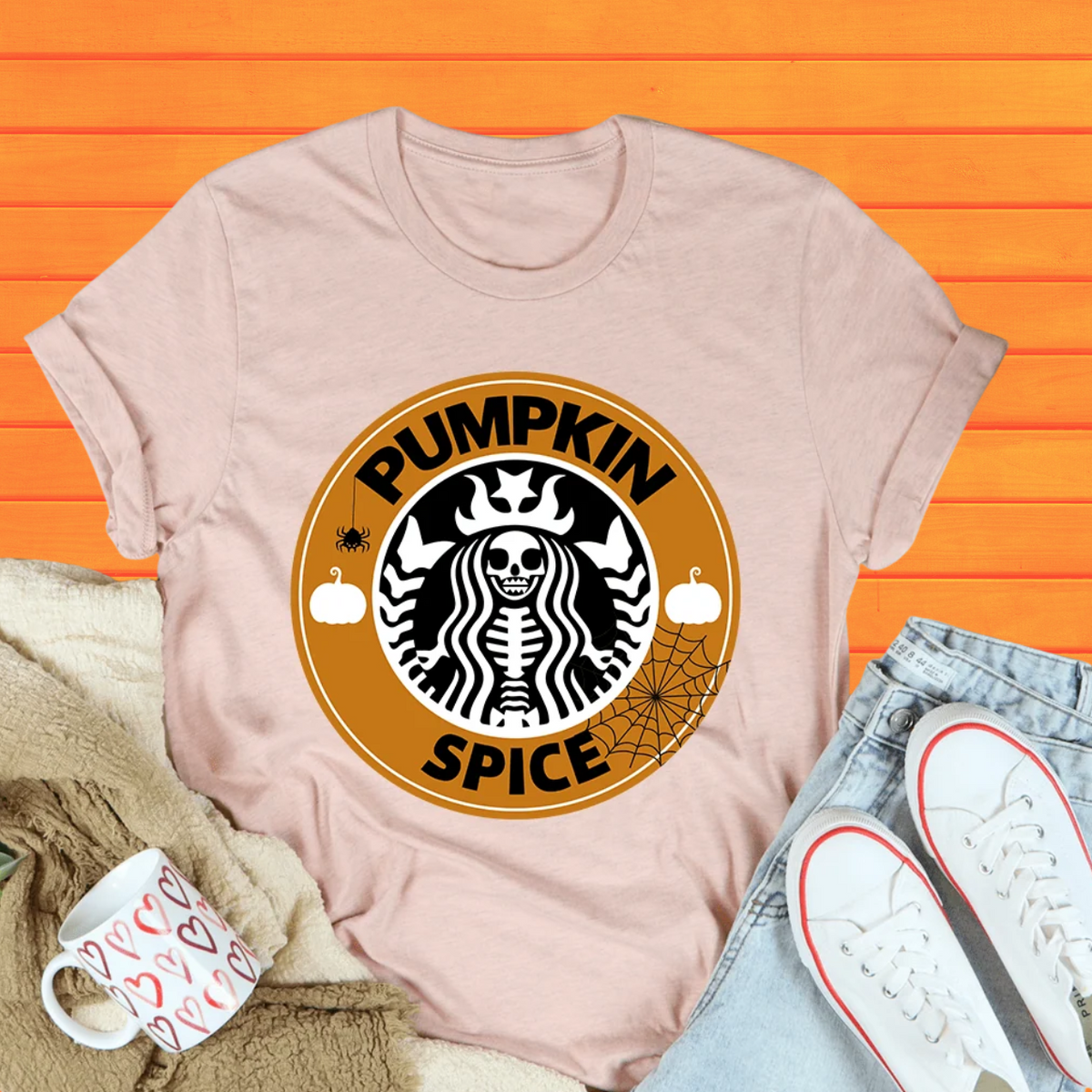Light blush crewneck T-shirt with Pumpkin Spice graphic logo on front