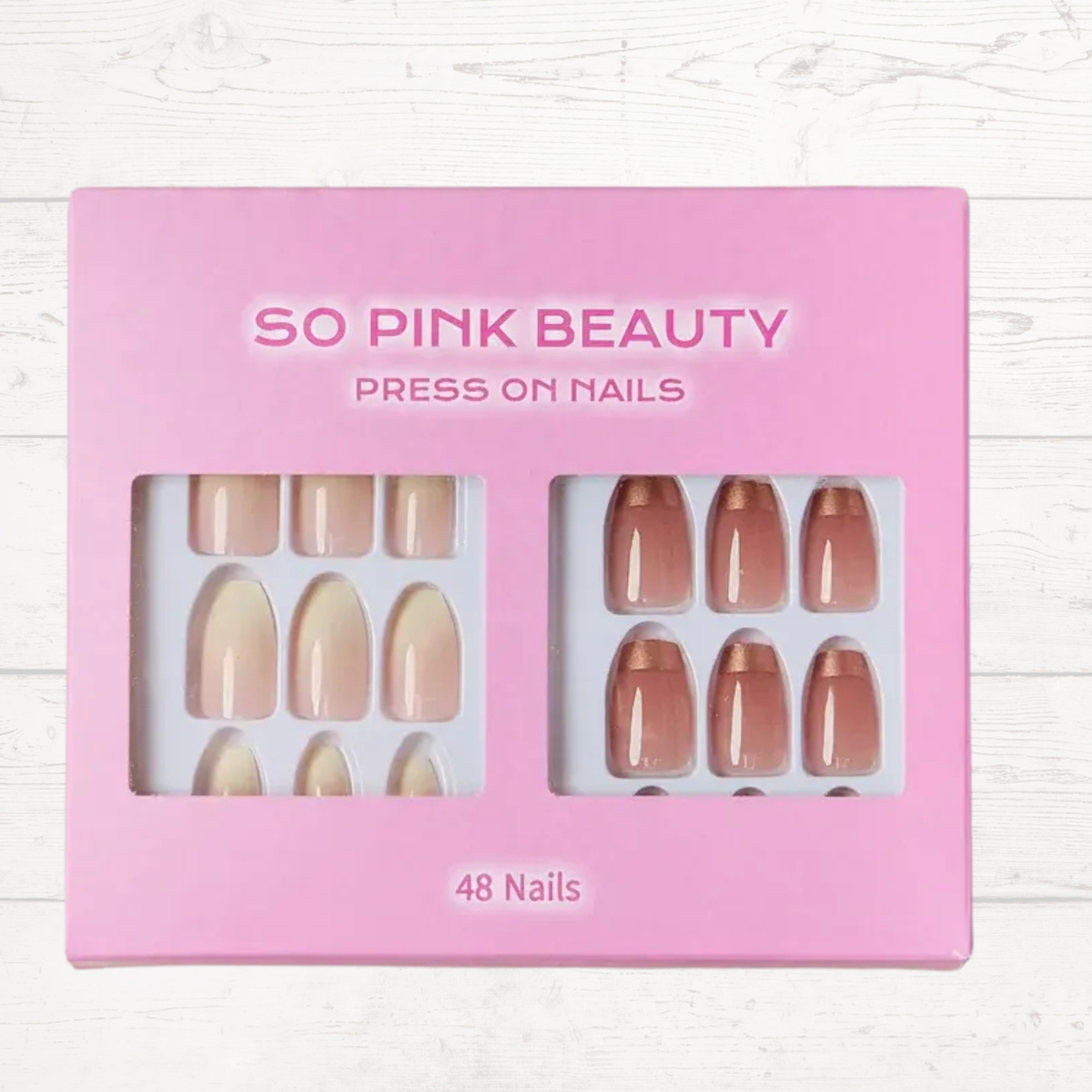 Press-on nail set in pink display box, nude and gold accent tips, 48 nails