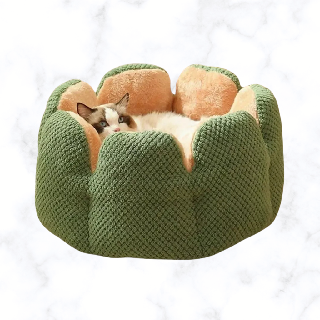 Dark green plush pet nest with cushioned flower-petal sides and cream center