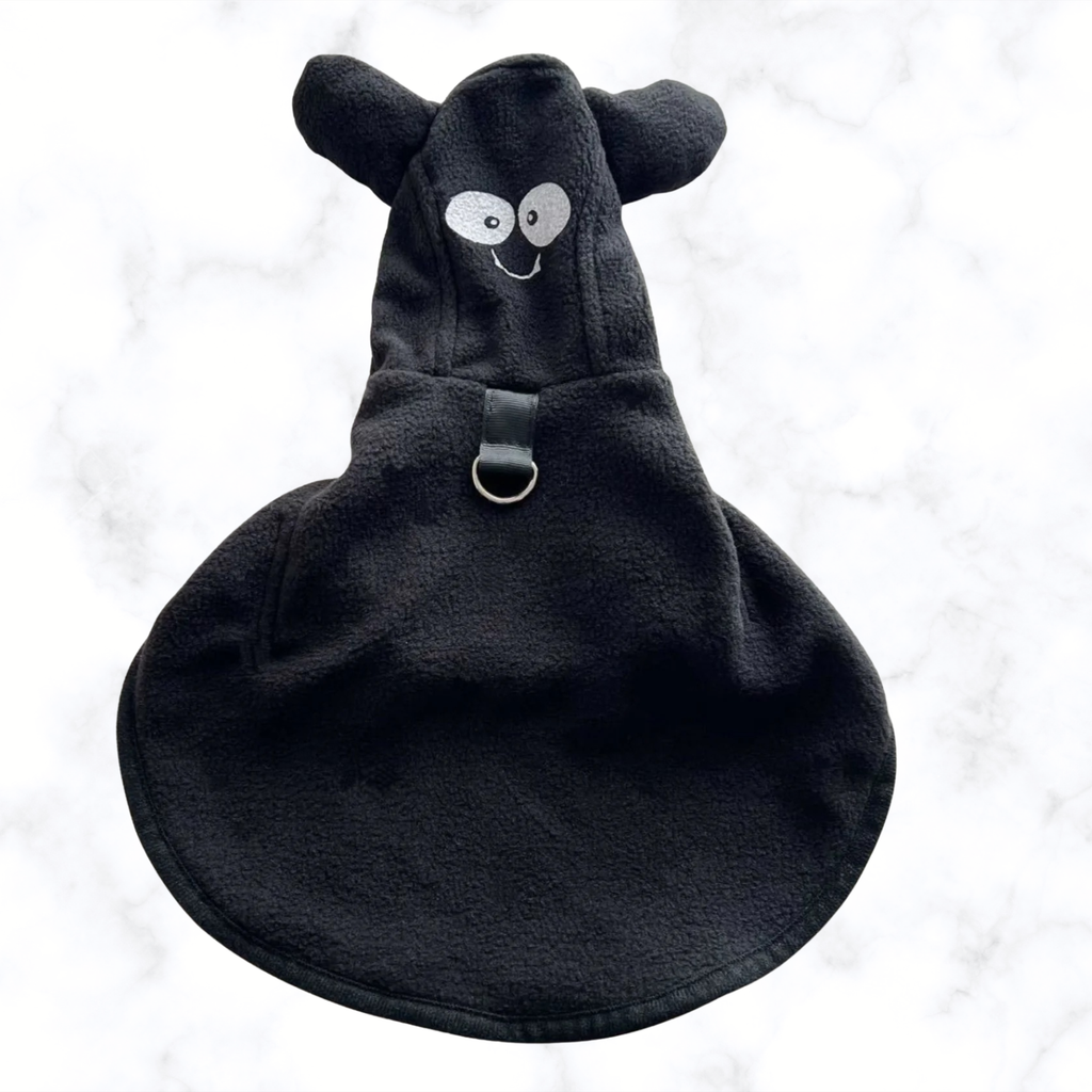 Black hooded pet costume coat with rounded ears, cartoon face, and front buckle strap