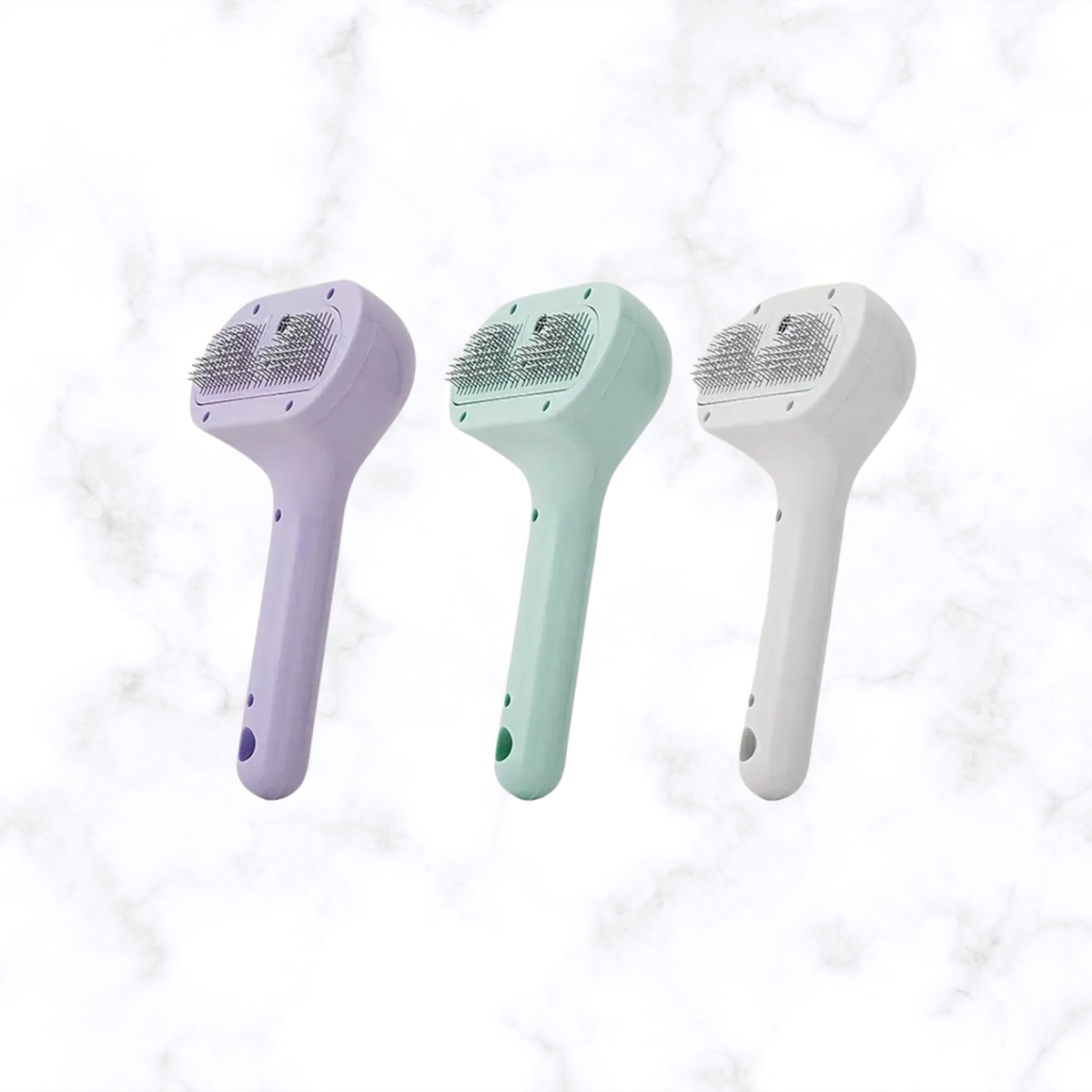 Pet hair remover comb, lilac and mint and white with textured bristle pads.