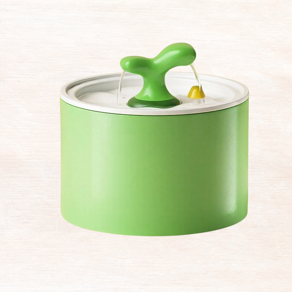 Matcha green automatic pet fountain with central spout and yellow drip outlet