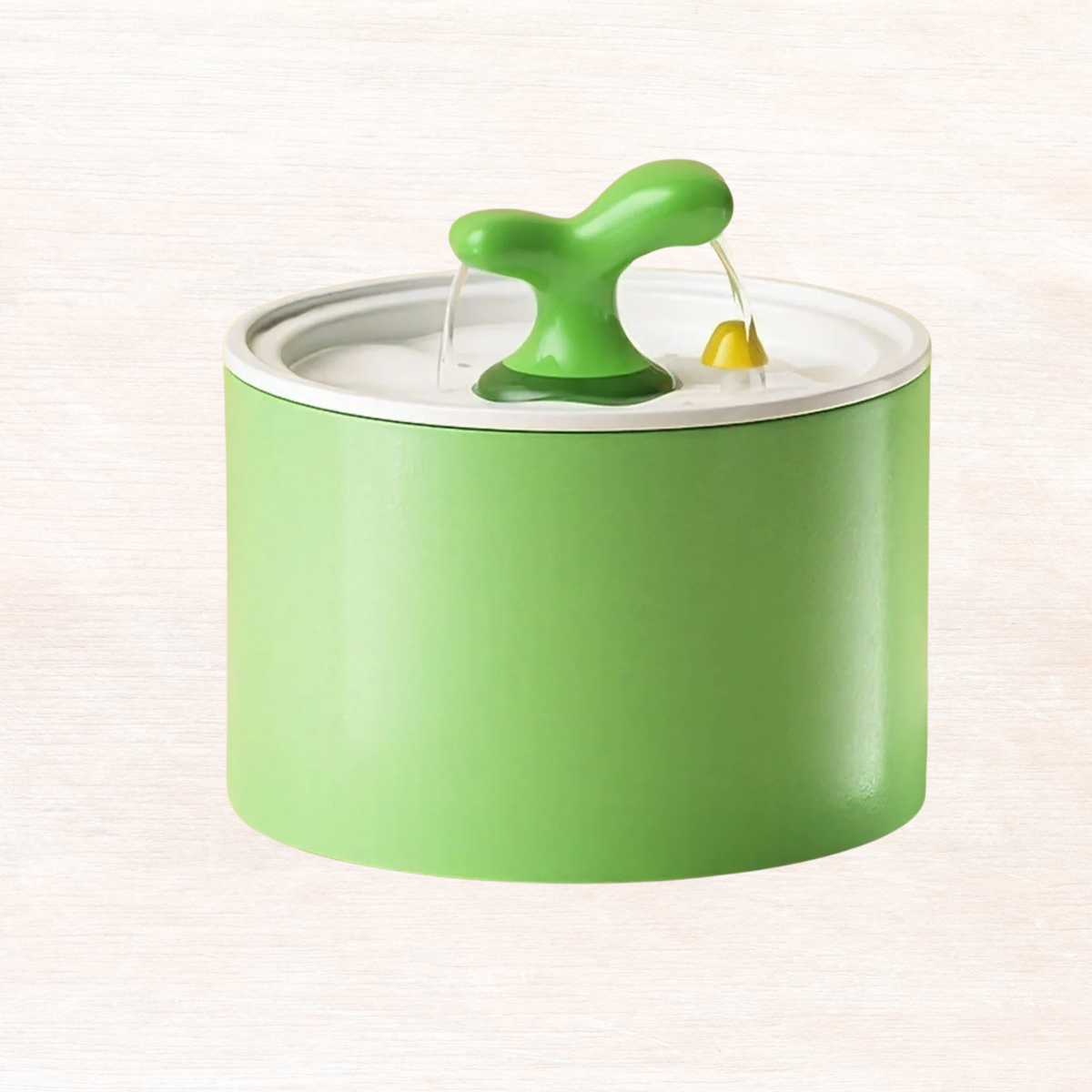 Matcha green automatic pet fountain with central spout and yellow drip outlet