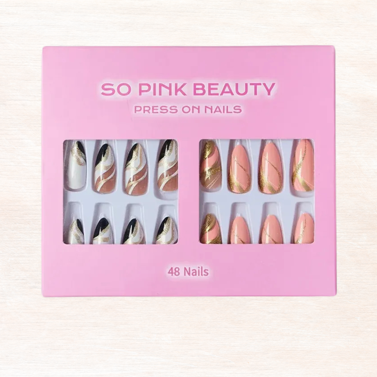 Press-on nail set in box, gold accent nude pink and white designs, 48 nails