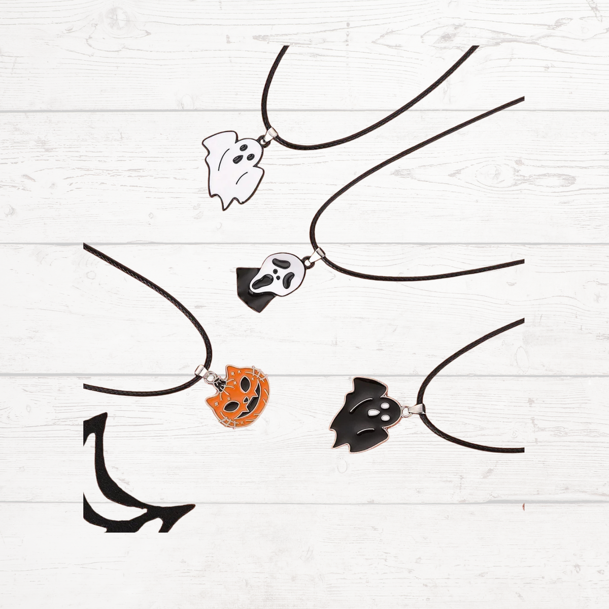Assorted Halloween ghost bat pumpkin charm necklaces on black cords