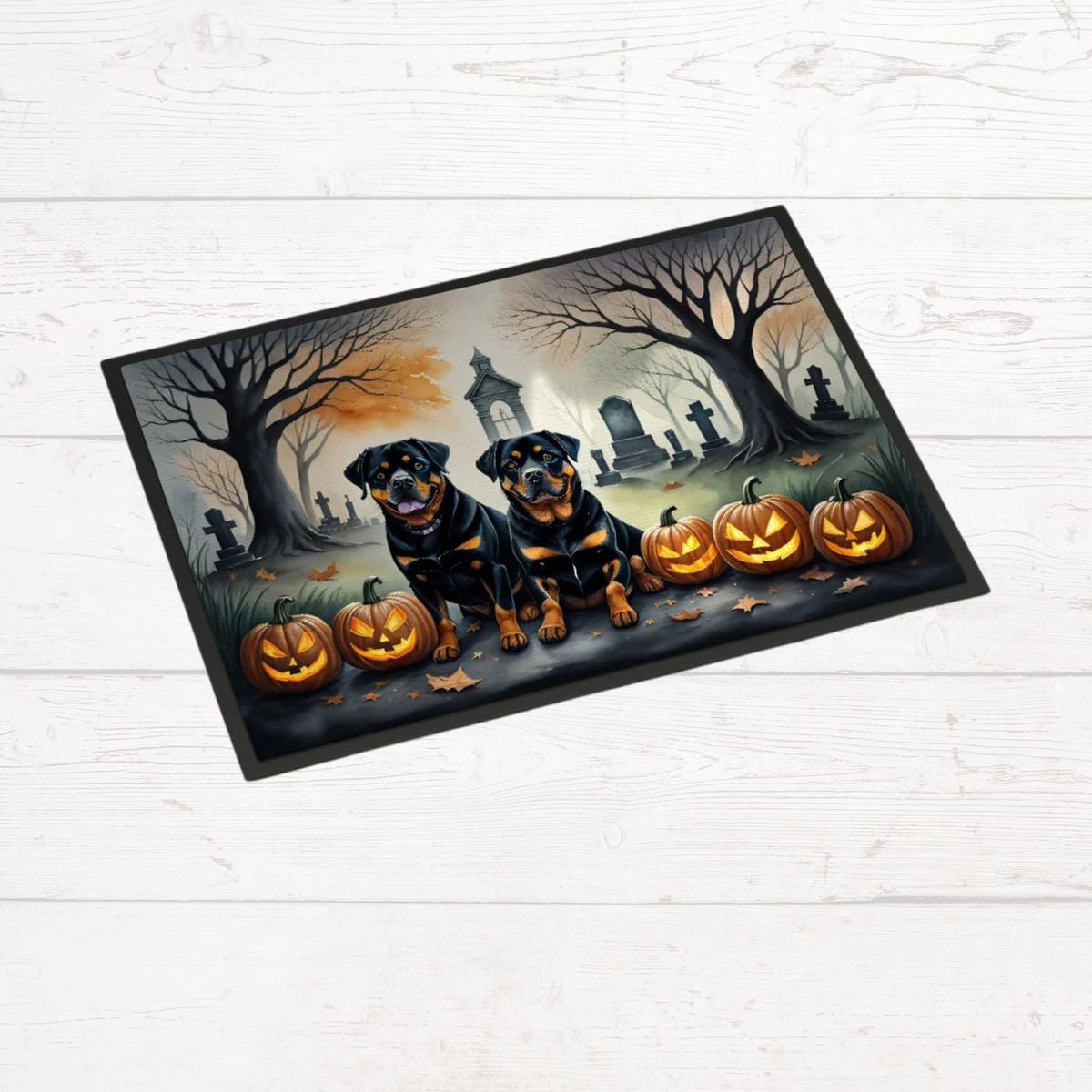 Halloween rottweiler doormat with two rottweilers, jack-o-lanterns, and cemetery backdrop