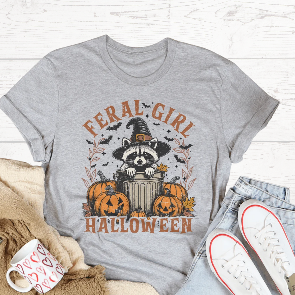 Heather gray Halloween graphic tee with raccoon in witch hat and pumpkins