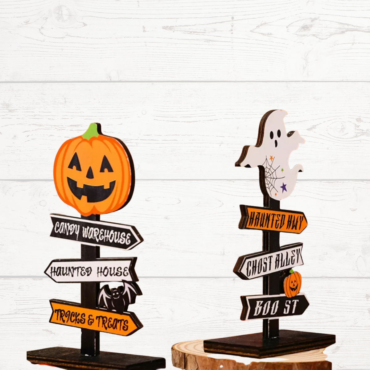 Set of Halloween wooden signpost ornaments with pumpkin and ghost figures on black bases