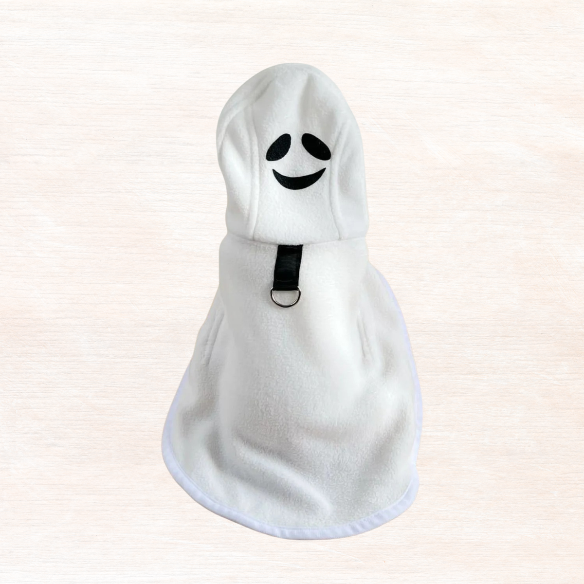 White hooded pet costume coat with smiling face patch and front buckle strap