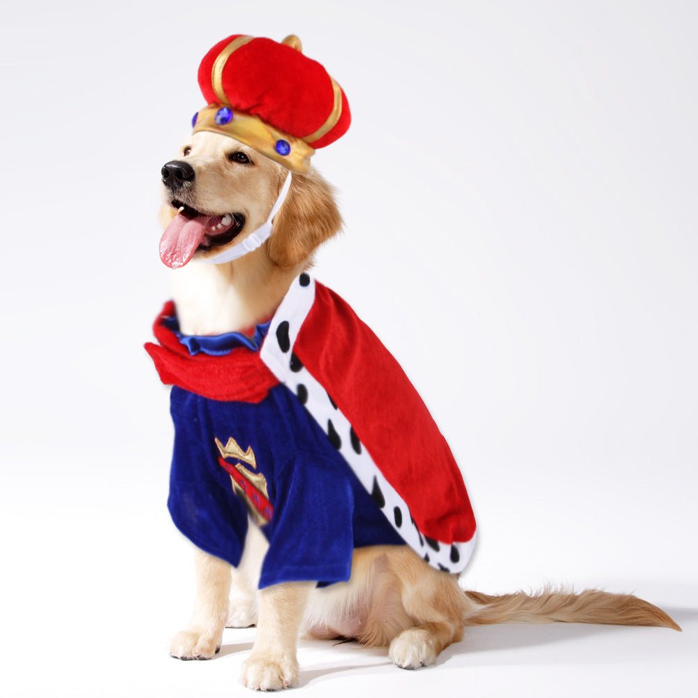 Dog wearing blue king pet costume with red cape, white spotted trim, and red crown hat