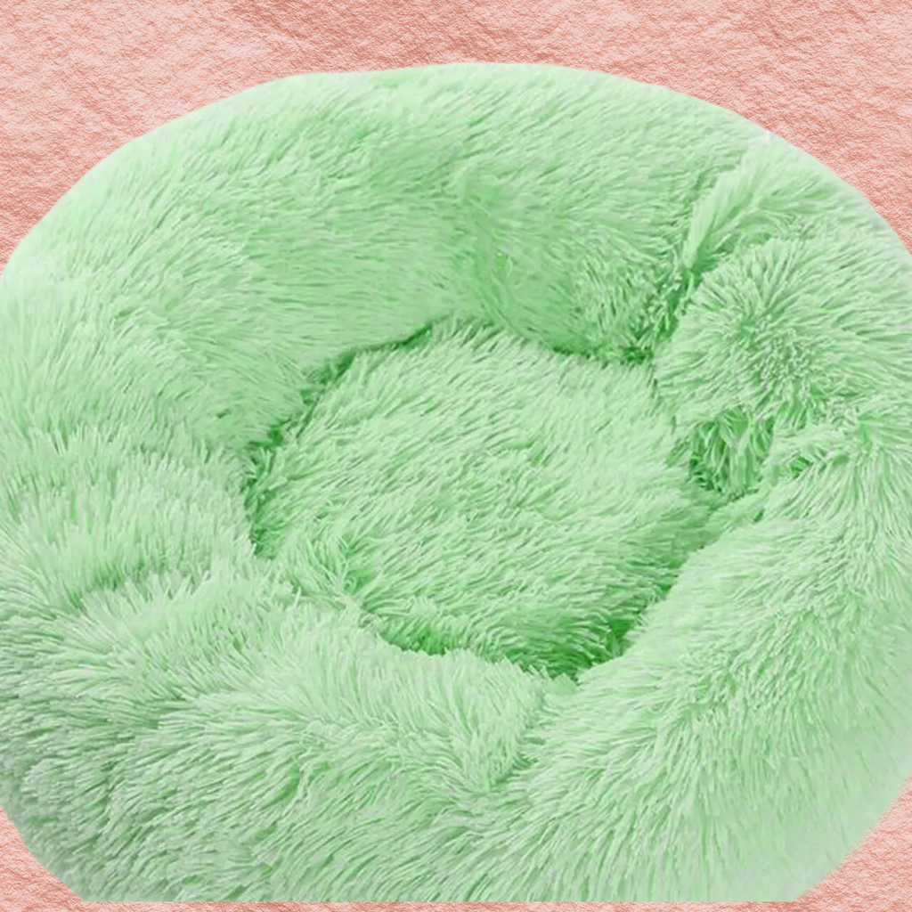 Fluffy plush donut pet nest in bright light green, round donut bed