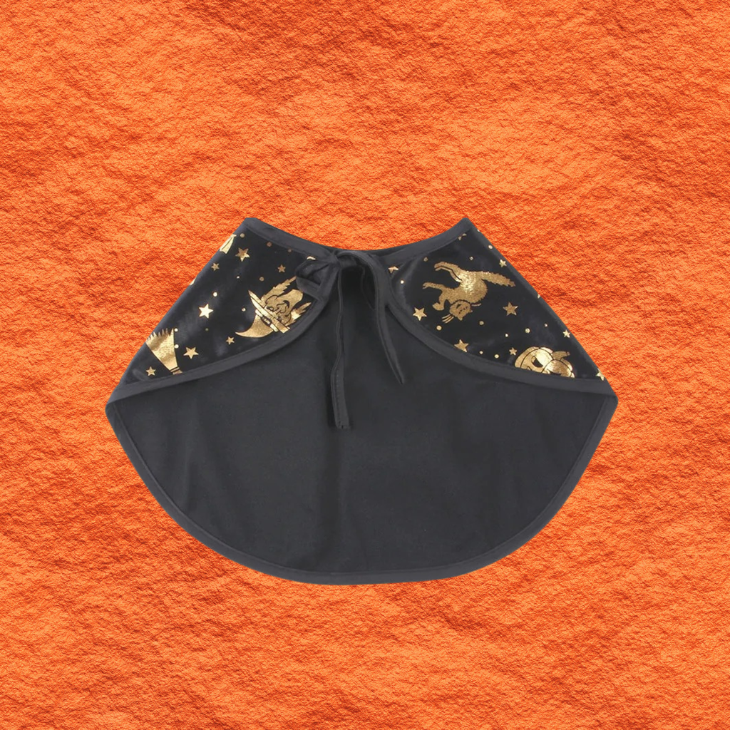 Black pet witch cape with gold cat-themed prints and center drawstring