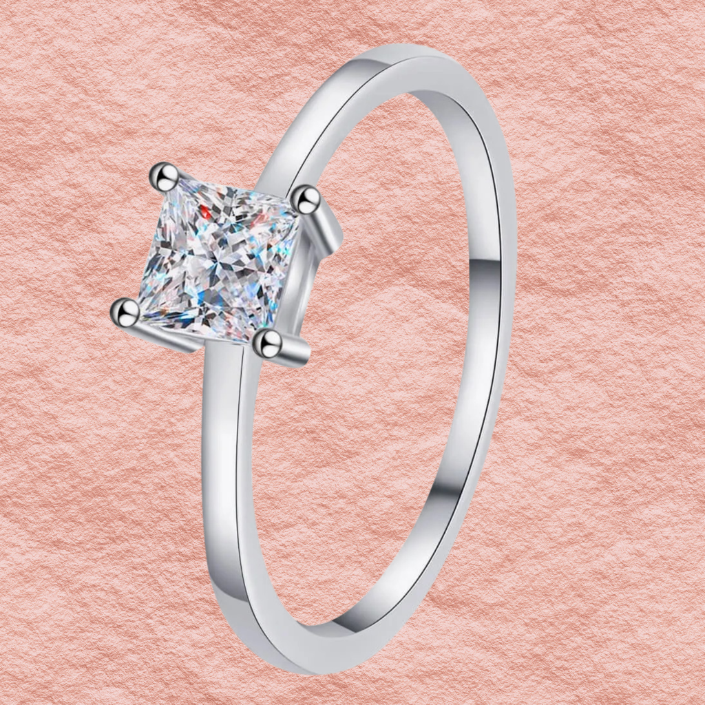 Sterling silver solitaire ring with four-prong princess-cut moissanite centerpiece