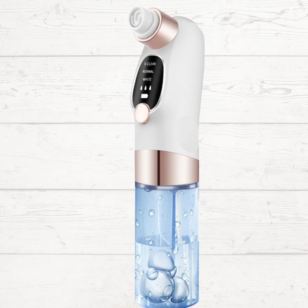 White handheld facial cleansing device with rose-gold display and rotating head