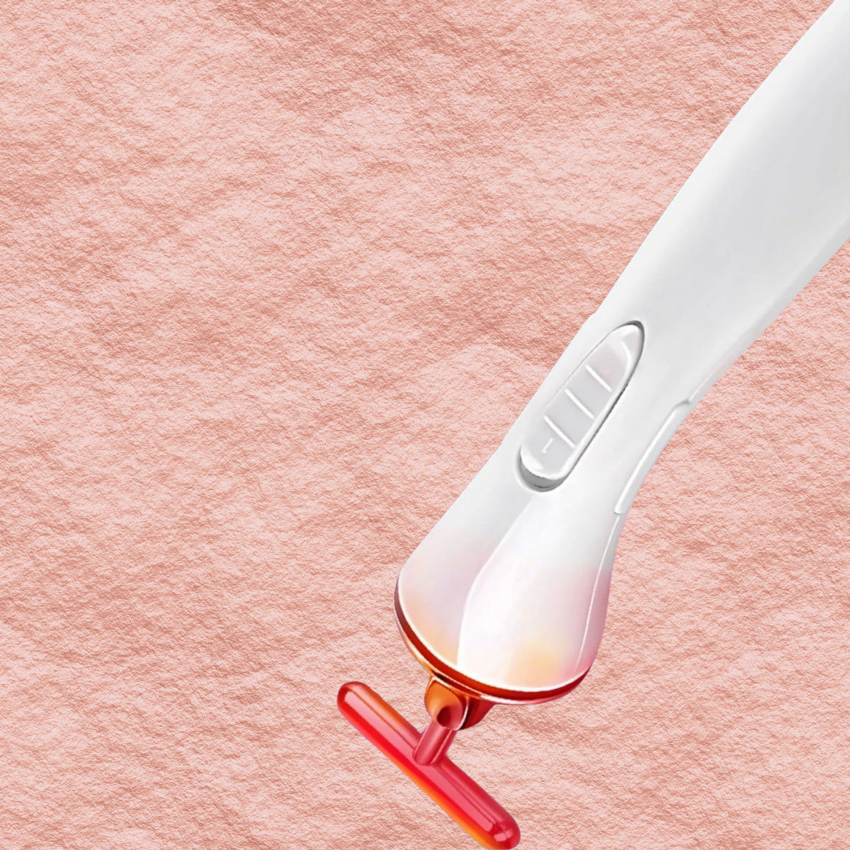 White facial massager with T-shaped electrode and control button detail