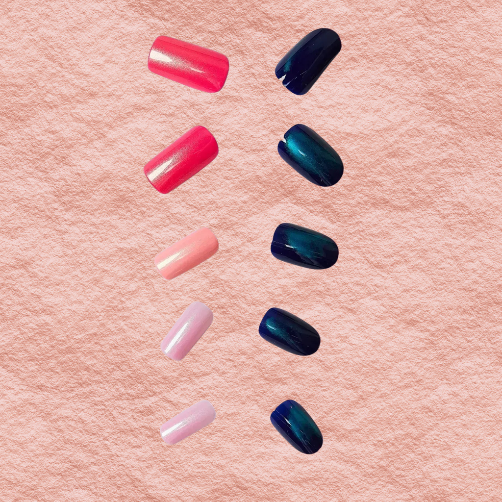 Press-on nails assortment: glossy red, pink, and dark blue-green chrome oval nails