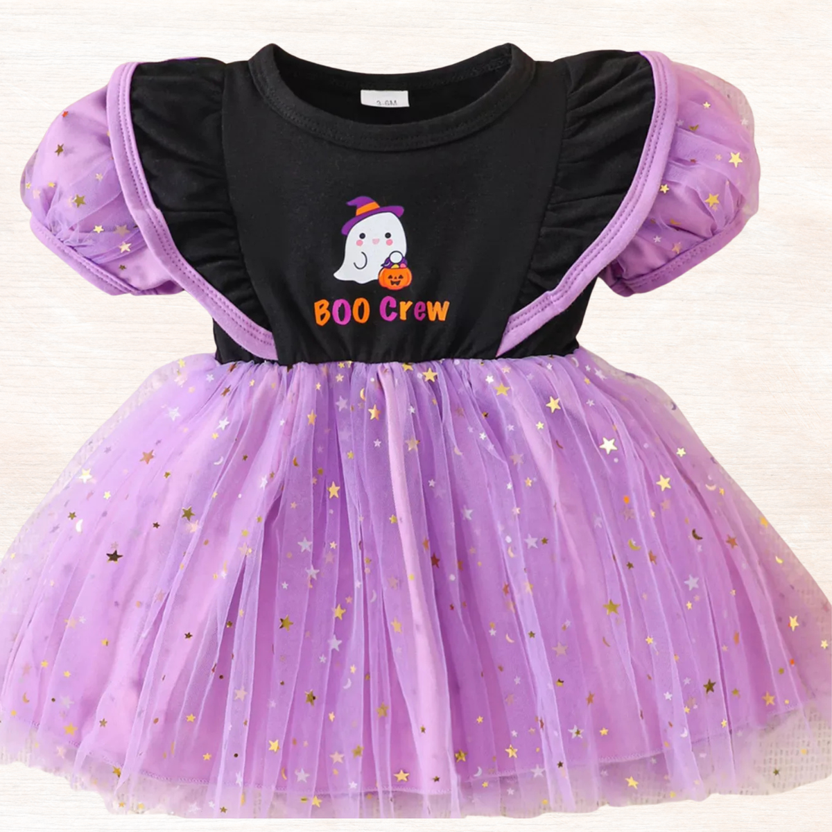 Purple tulle tutu dress with black top and ghost “BOO Crew” graphic
