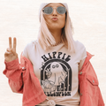 Heather gray Halloween graphic T-shirt worn by model with Hippie Halloween arch cat print