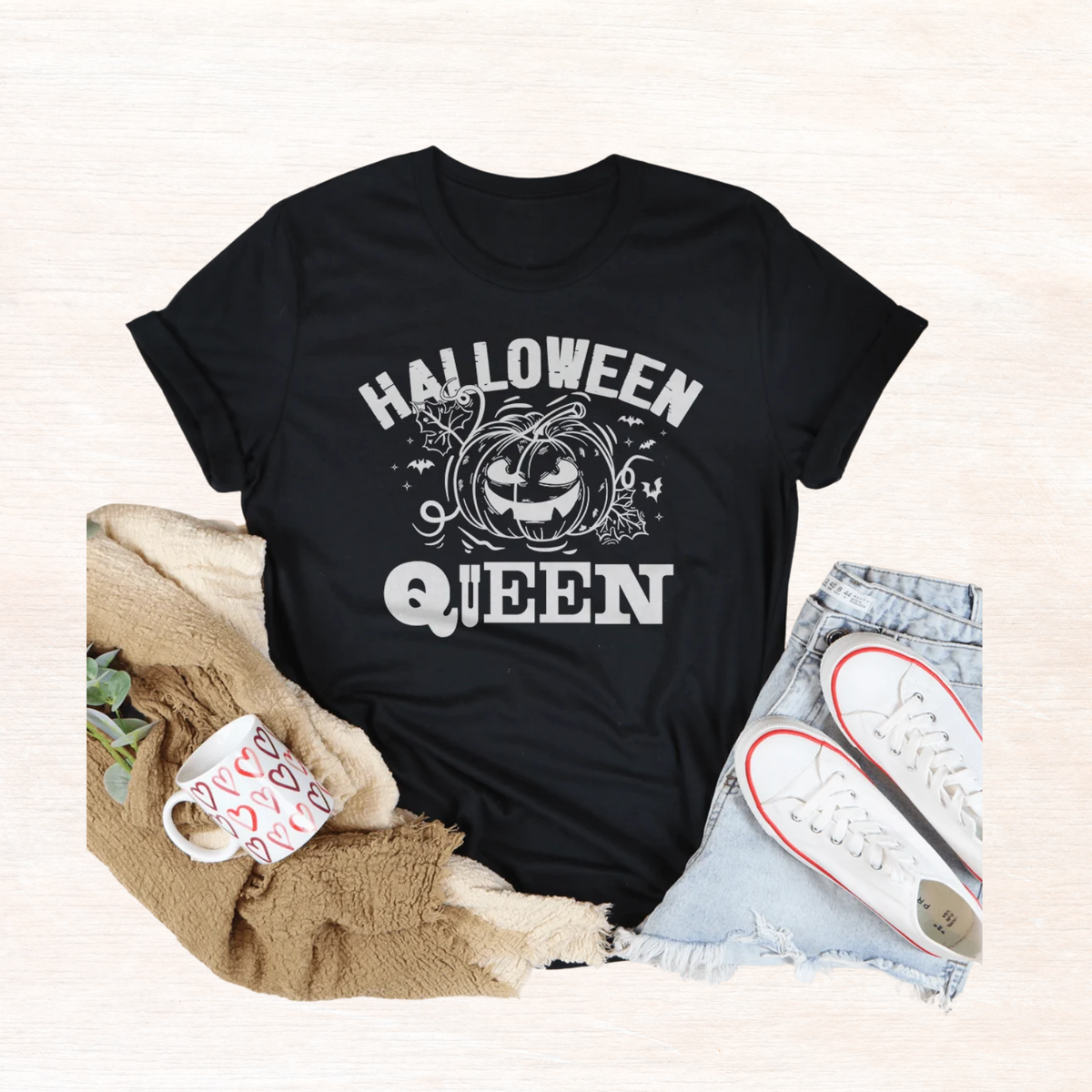 Black short-sleeve Halloween Queen graphic tee with jack-o-lantern illustration