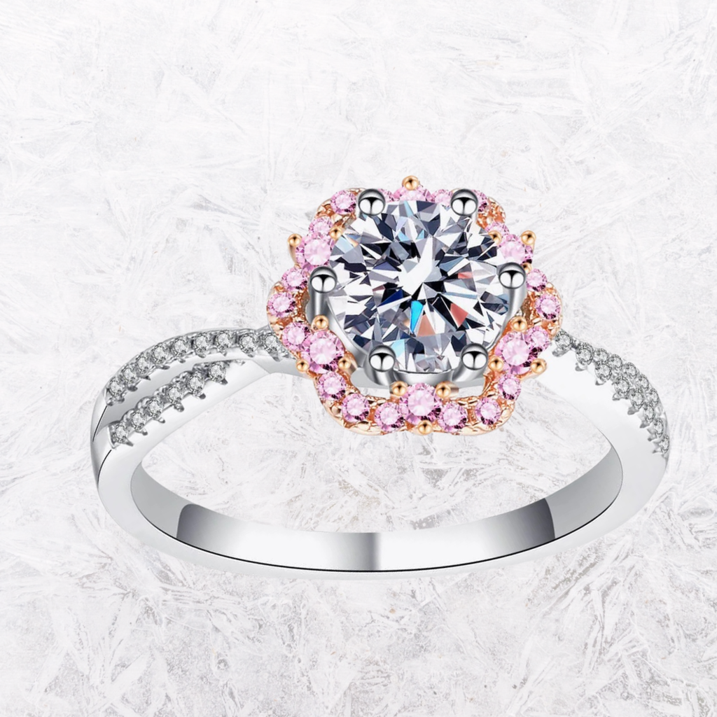 Moissanite flower-shaped crisscross ring with pink halo and silver band