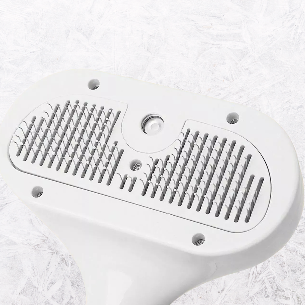 White pet hair remover comb with dual metal bristle grids on oval head.