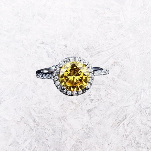 Moissanite sterling silver ring with yellow round center stone and halo accents