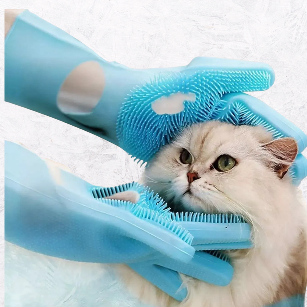Sky blue pet grooming glove with raised bristles on a cat