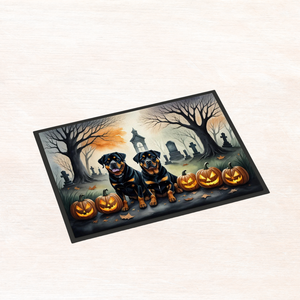 Halloween rottweiler doormat showing two rottweilers, pumpkins, and haunted graveyard