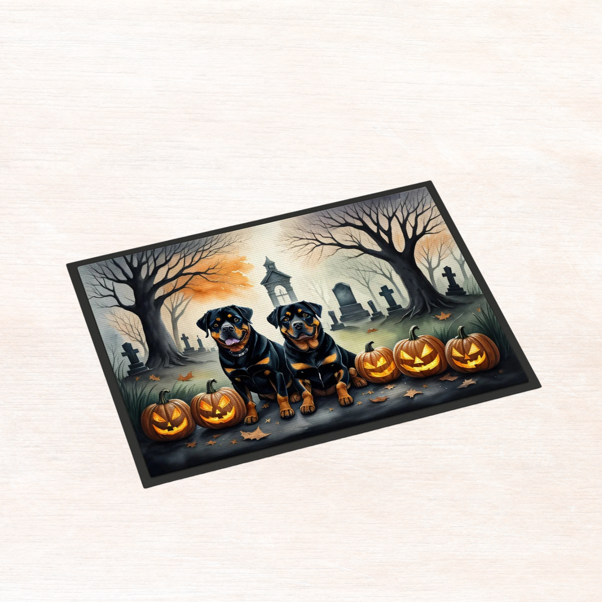 Halloween rottweiler doormat showing two rottweilers, pumpkins, and haunted graveyard
