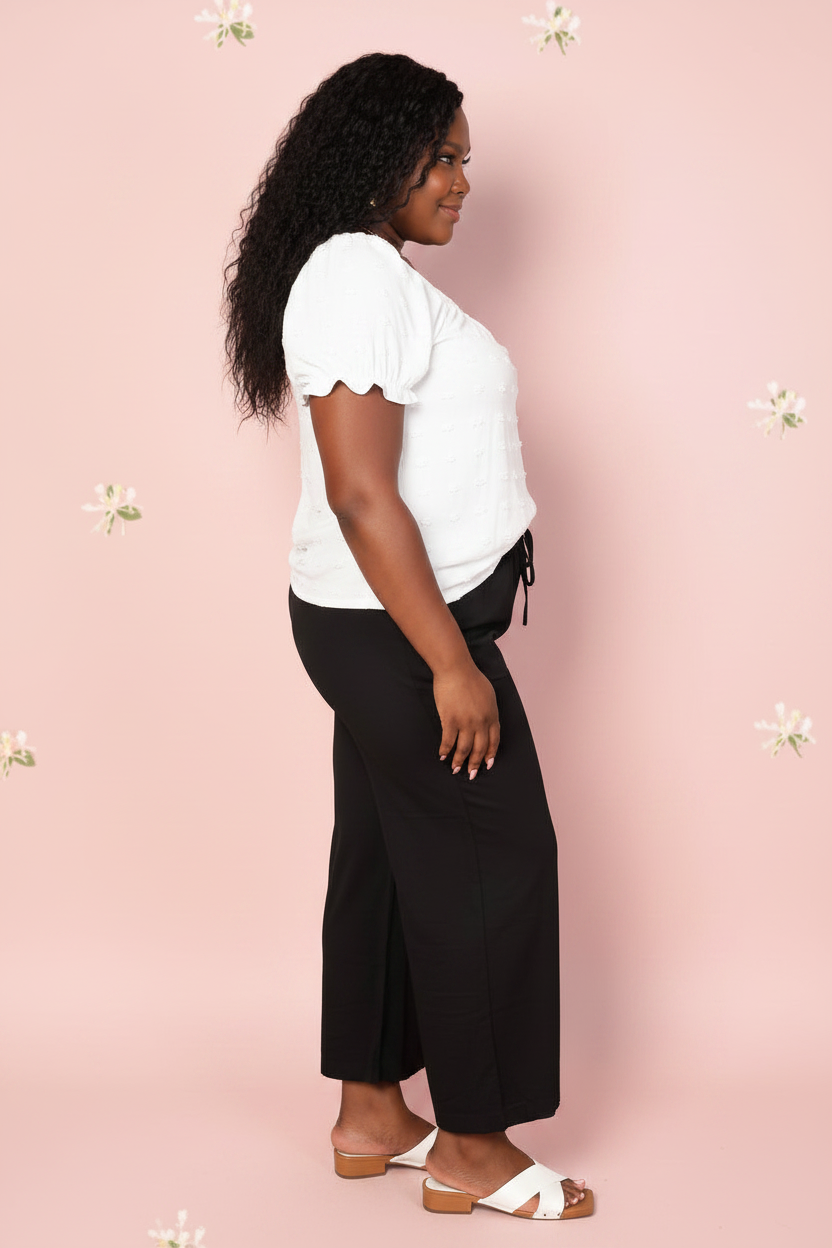 White swiss dot blouse with puff sleeves and square neckline