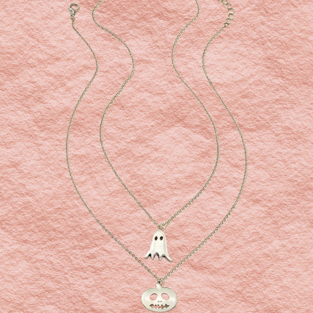 Silver two-strand necklace with ghost charm and round jack-o-lantern charm.