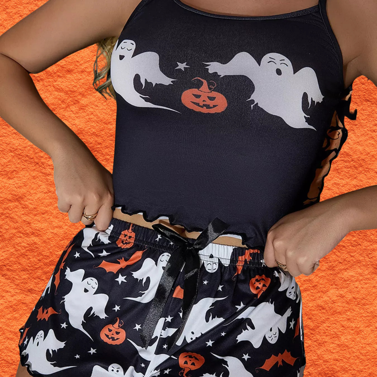 Black cami with ghost and pumpkin graphic; matching shorts with Halloween pattern