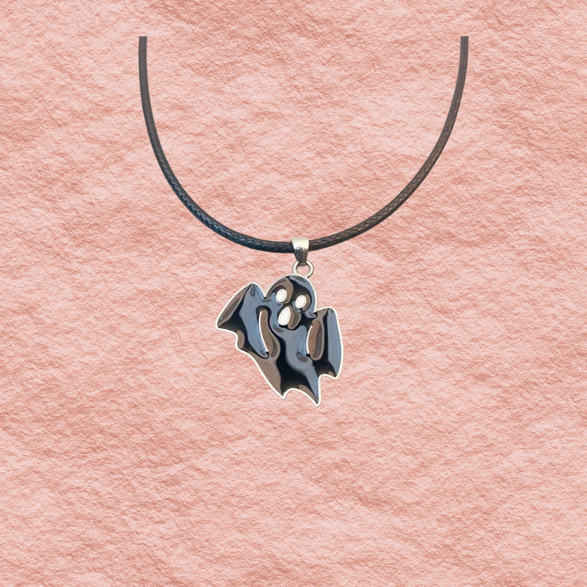 Halloween bat ghost pendant necklace with black cord and dark ghost face charm