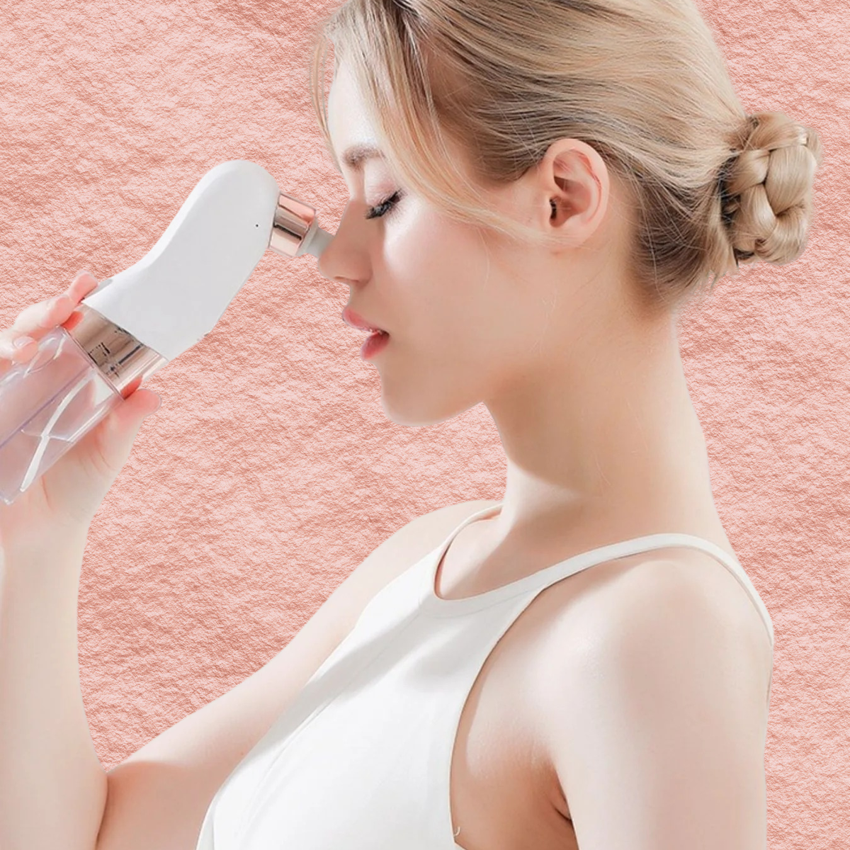 White facial cleansing device with rose-gold head, used against neck area
