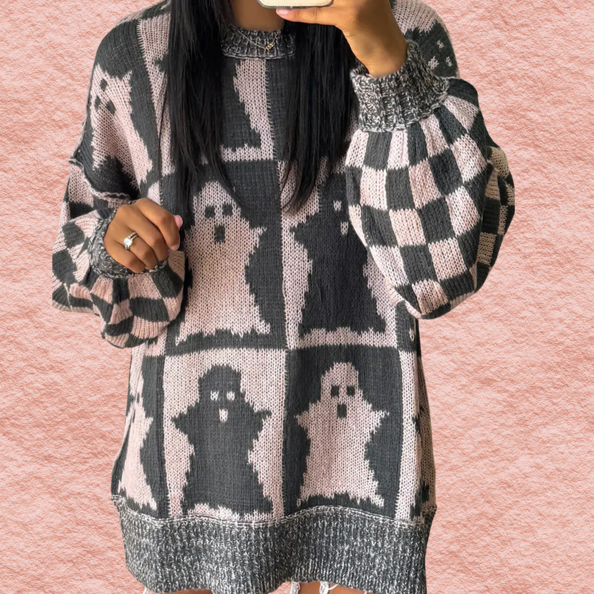 Dusty pink and black ghost knit long-sleeve sweater with dropped shoulders and checker trim