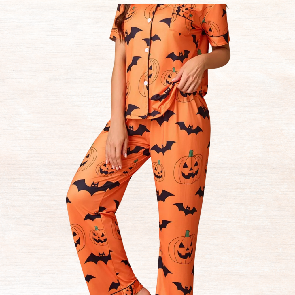 Orange Halloween pajama set with short-sleeve button top and lounge pants, pumpkin and bat