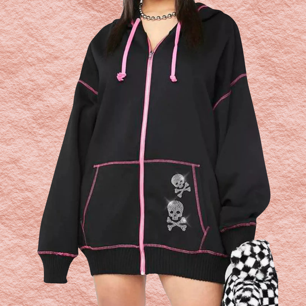 Black zip-up hoodie with pink piping, skull patch on front pocket panel.