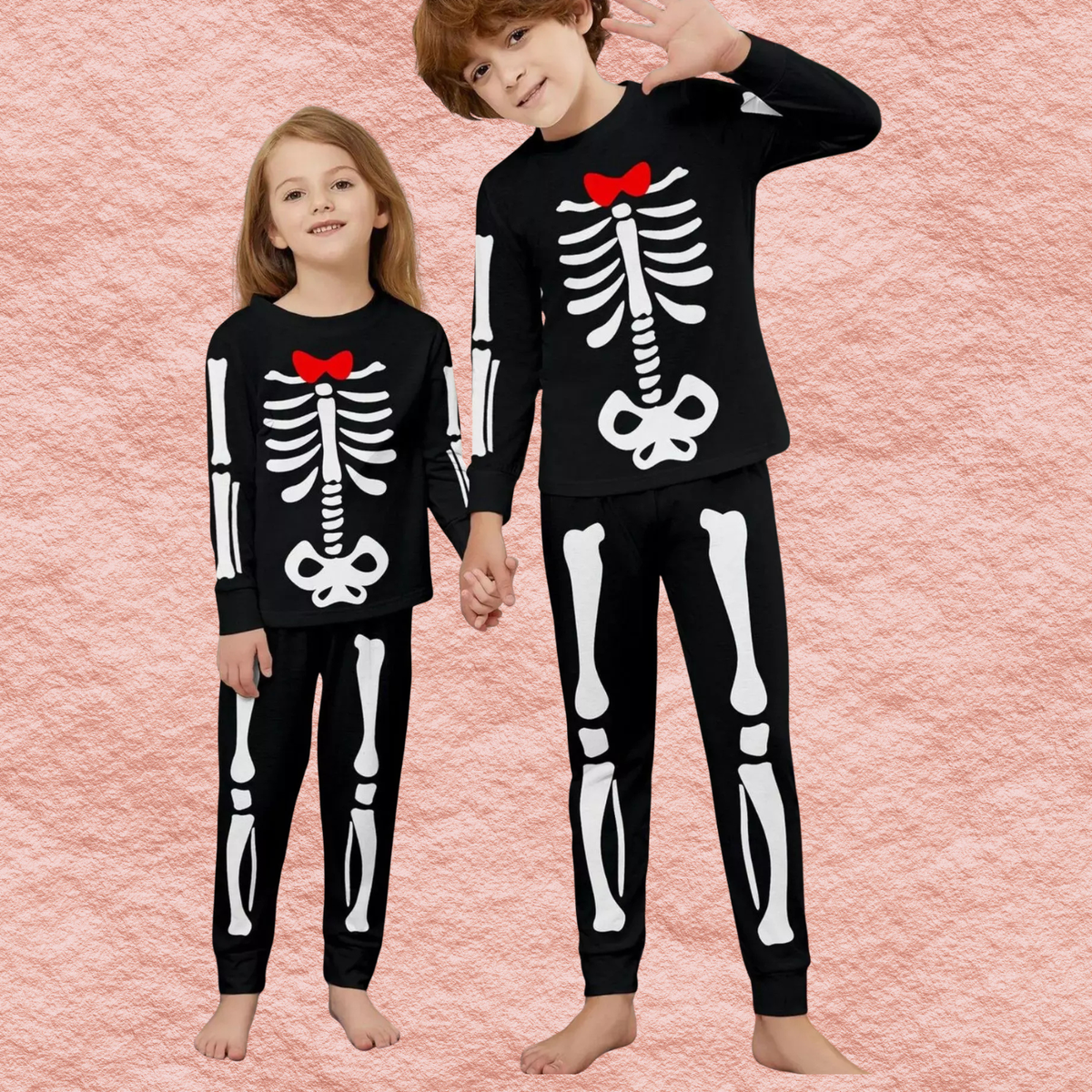 Black skeleton pajama set with long sleeves, red bow chest print, and long pants