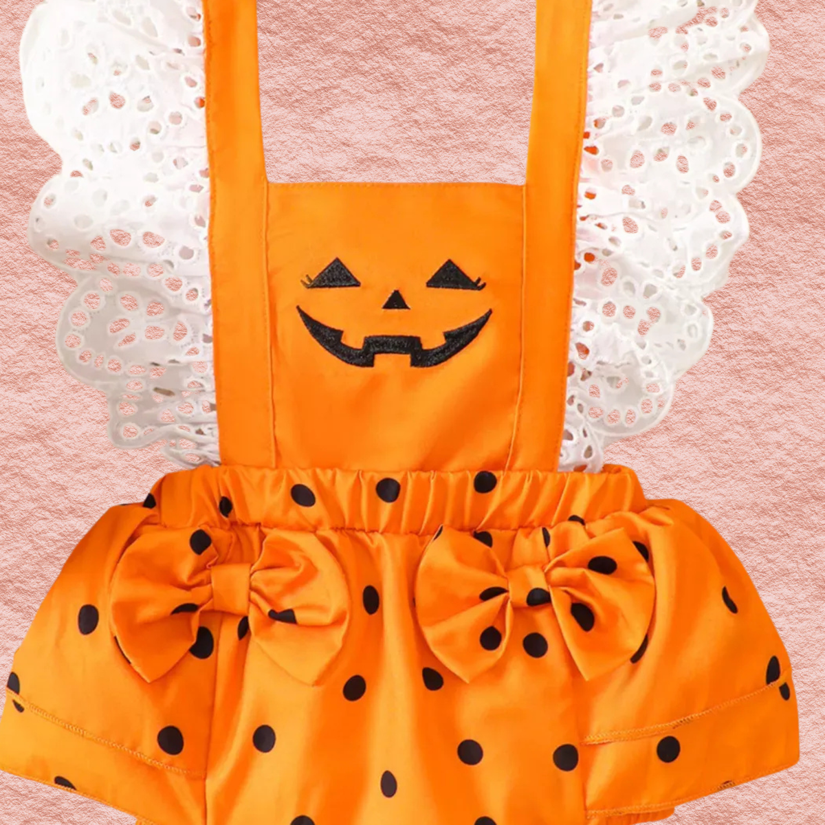 Kids Halloween bodysuit: orange puff sleeves, pumpkin face patch, black polka dots