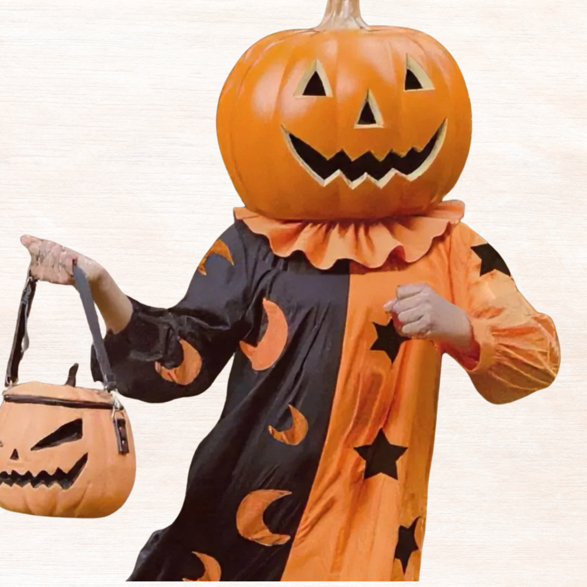 Two-tone tangerine and black star-and-moon jumpsuit with ruffled neckline and long sleeves