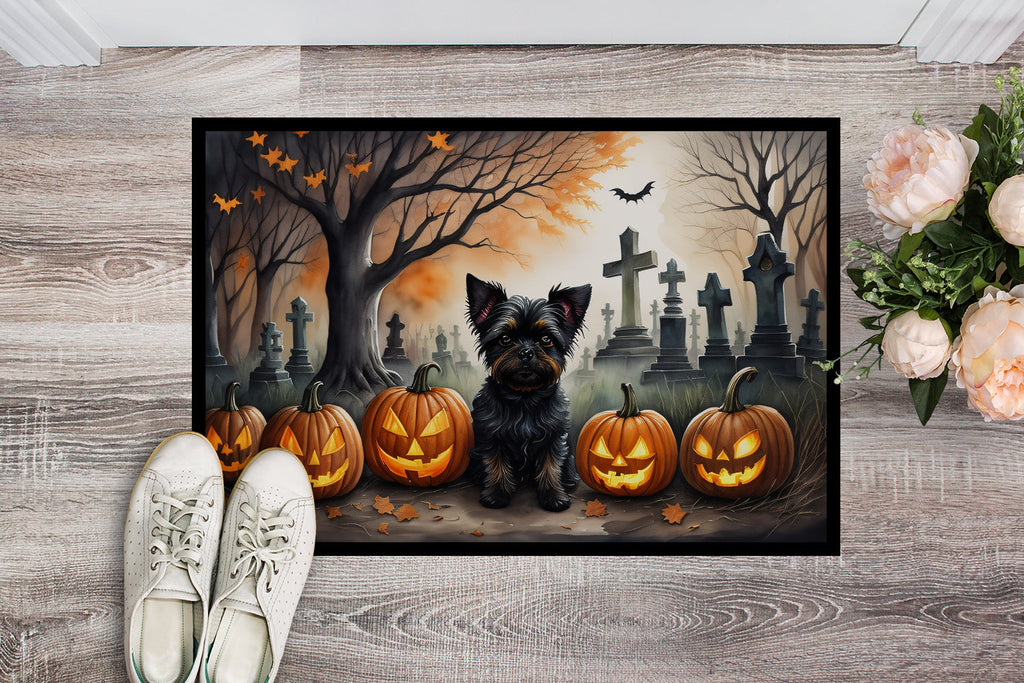Halloween doormat with Affenpinscher, jack-o'-lanterns, and tombstones in autumn sky