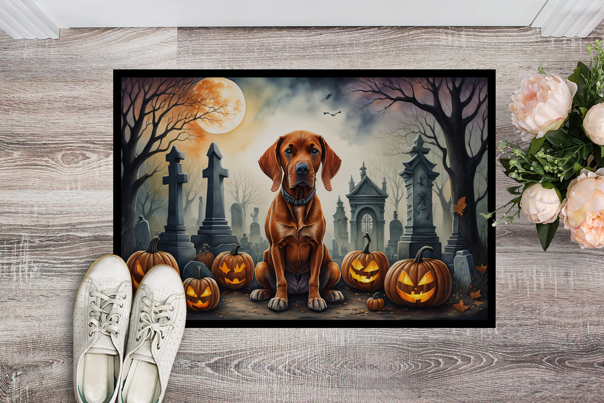 Halloween doormat featuring brown Vizsla, jack-o-lanterns, and haunted cemetery buildings