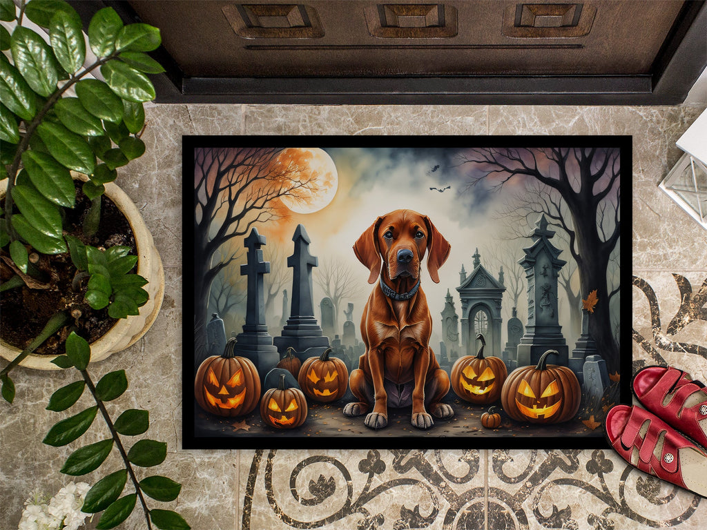 Halloween doormat with brown Vizsla center and orange jack-o-lanterns at a graveyard