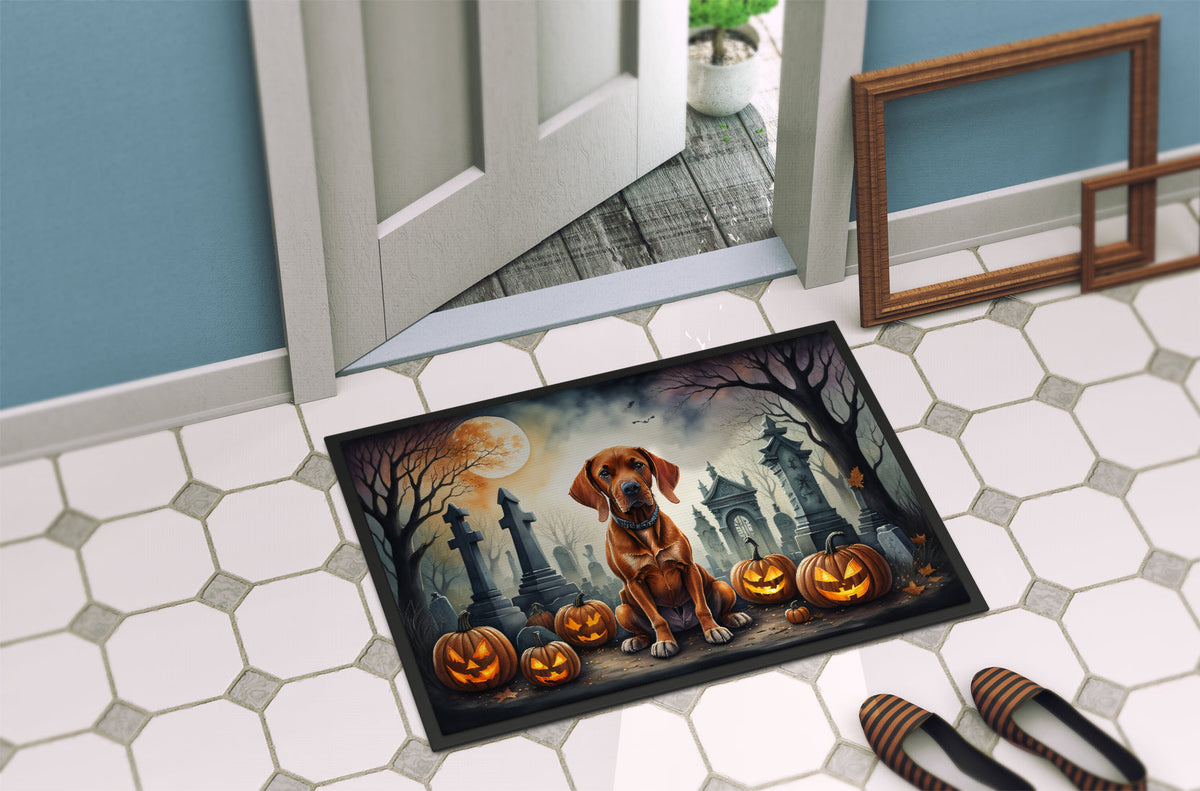 Halloween doormat showing brown Vizsla with pumpkins and tombstones on a floor tile