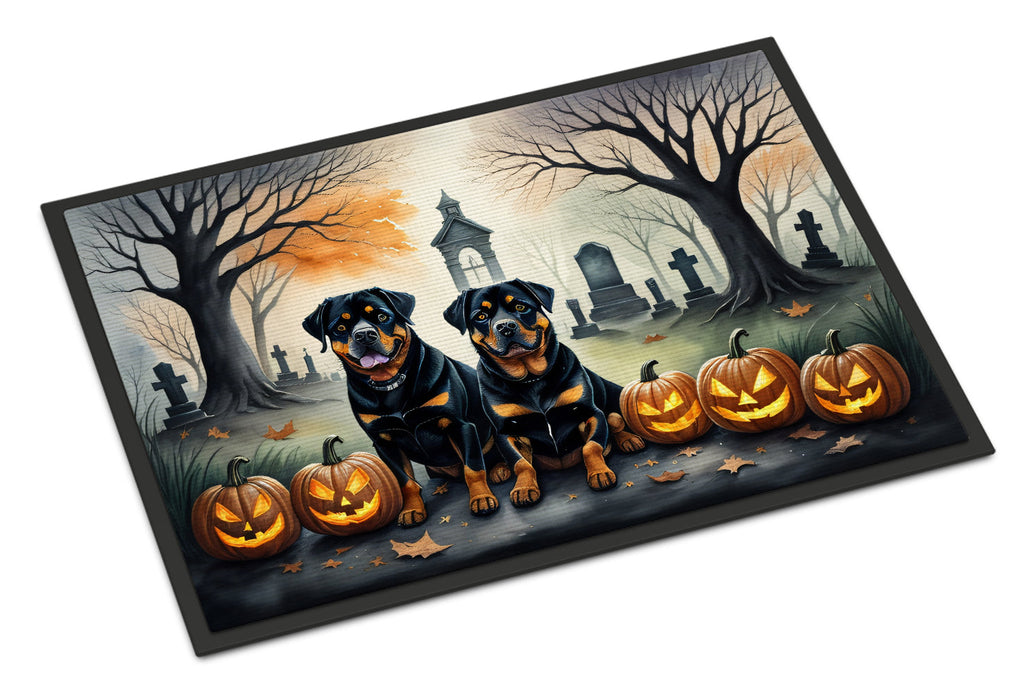 Halloween rottweiler doormat: two rottweilers, jack-o-lanterns, and graveyard scene